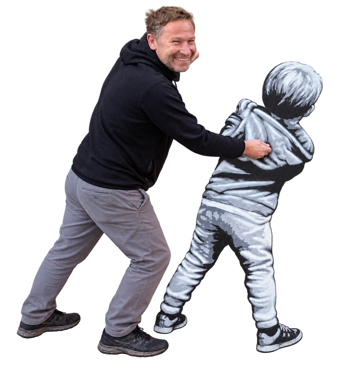 Harald und der kleine Junge entdecken gemeinsam die Öffnung in der grauen Wand